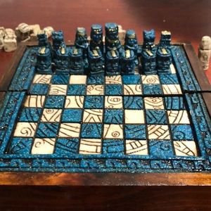 Turquoise and white chess case and table.